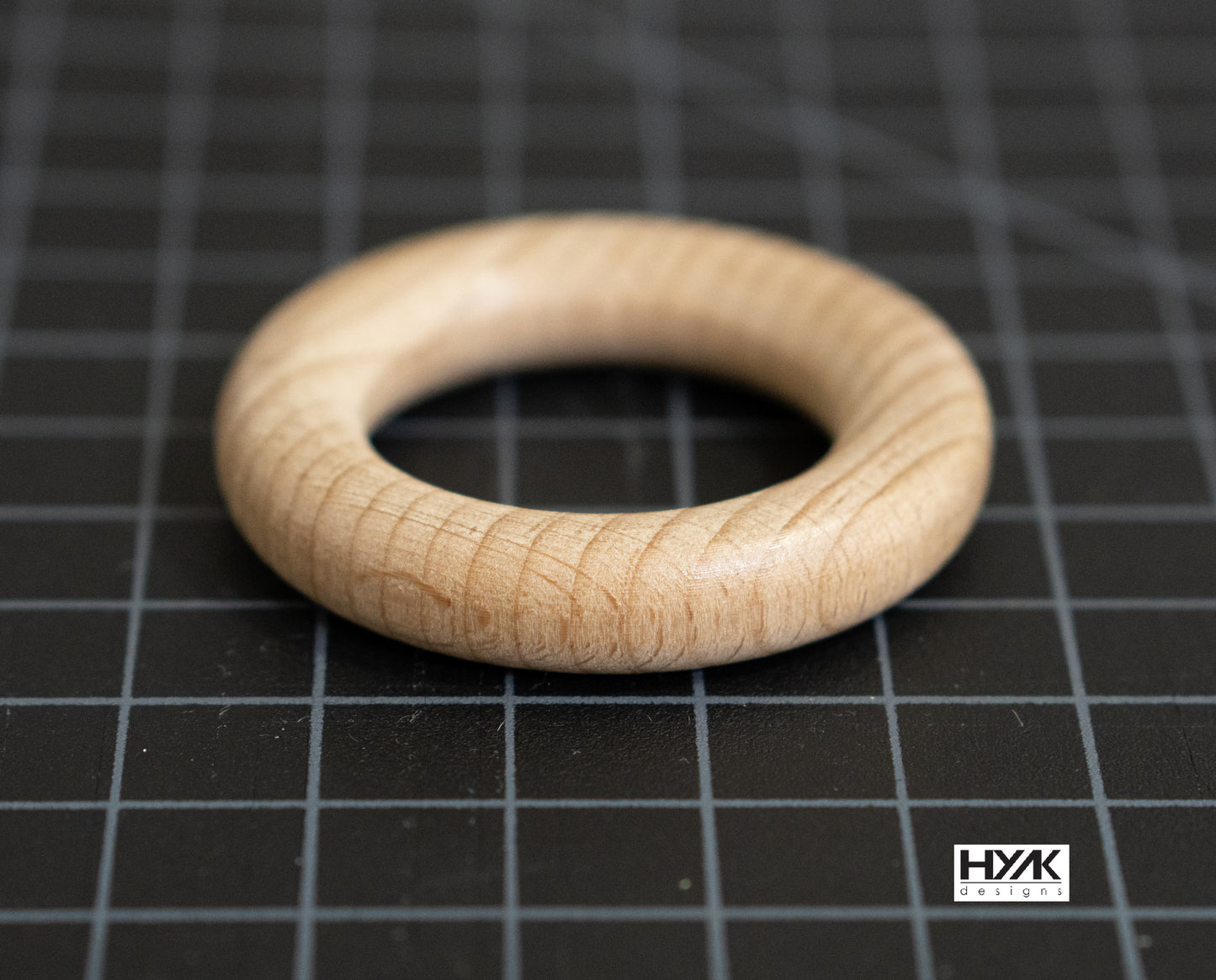 Natural beech wood ring for sewing, baby toys, pet toys, and DIY craft projects.