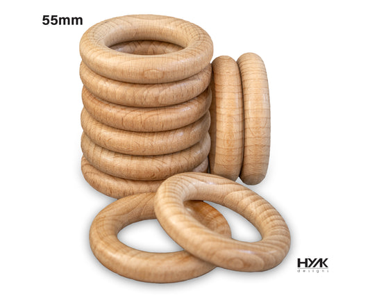 Unfinished wooden rings, 55mm, perfect for teething toys and craft projects. 
